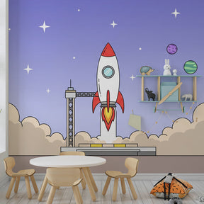 Space themed mural wallpaper with rocket launch pad inspiring cosmic dreams in children's room