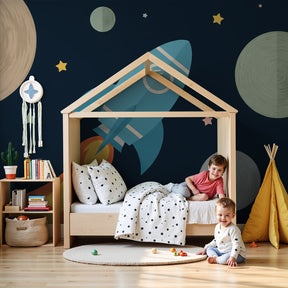 Space rocket mural wallpaper creating cosmic nursery decor with stars and planets by Kids-Mundo