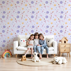 Space rocket mural wallpaper decorating modern nursery with colorful galaxy theme by Kids-Mundo