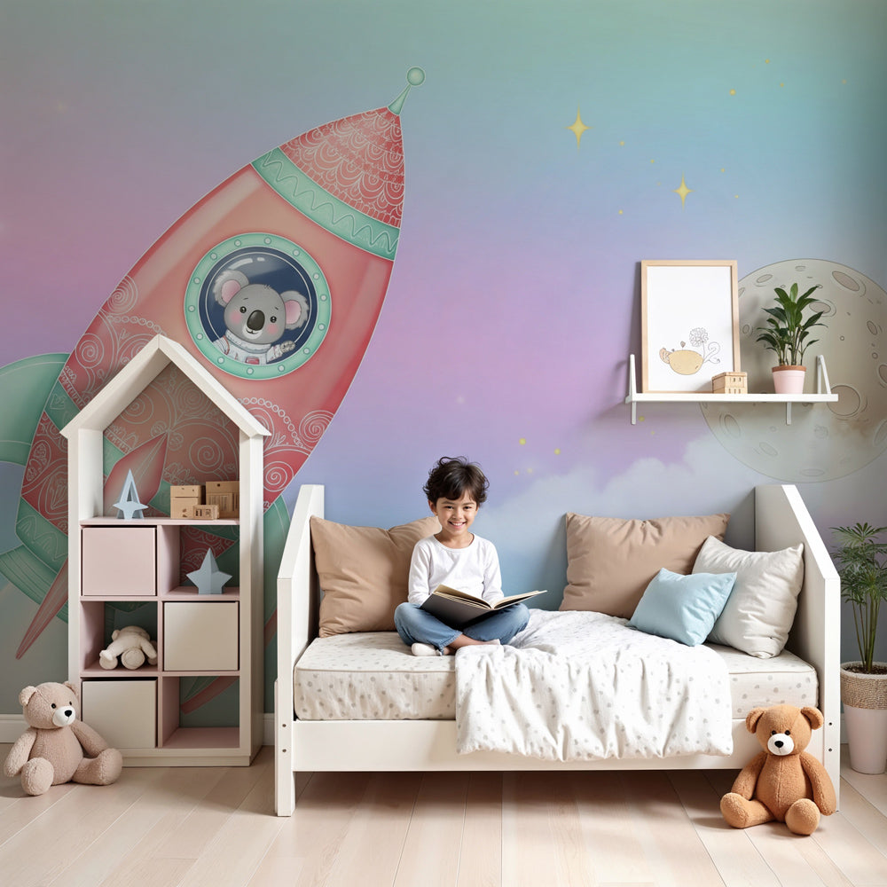 Space rocket mural wallpaper with koala explorer in modern nursery room by Kids-Mundo