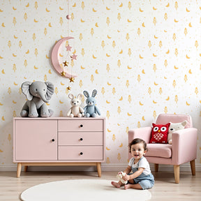 Space rocket mural wallpaper with golden moons in modern nursery by Kids-Mundo