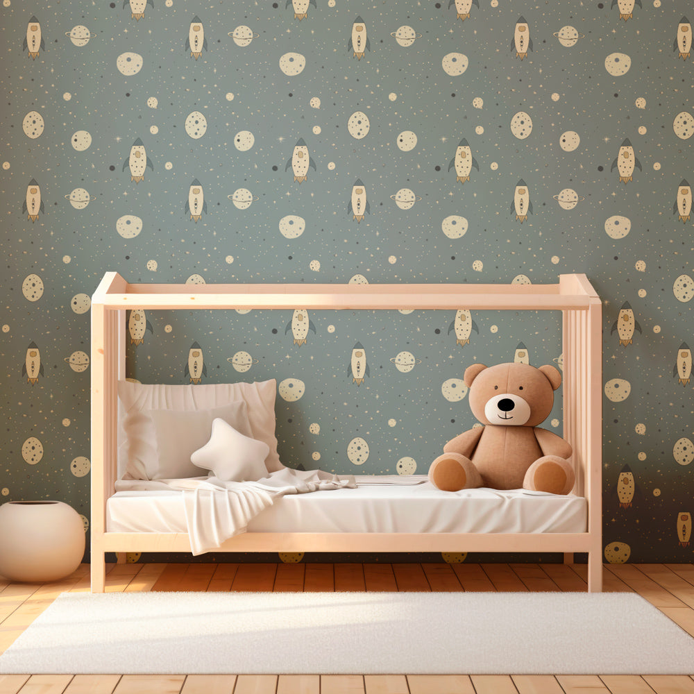 Blue space wallpaper featuring rockets and planets in cozy nursery room decor