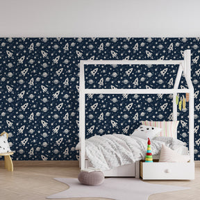 Children's space themed mural wallpaper in colorful playroom setting