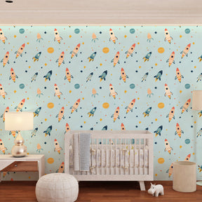Blue space themed mural wallpaper transforming children's playroom into galactic adventure