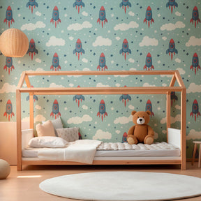 Rocket themed mural wallpaper transforming children's playroom into space adventure