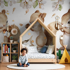 Baby squirrel mural wallpaper in modern nursery with three woodland creatures on flowering branch by Kids-Mundo