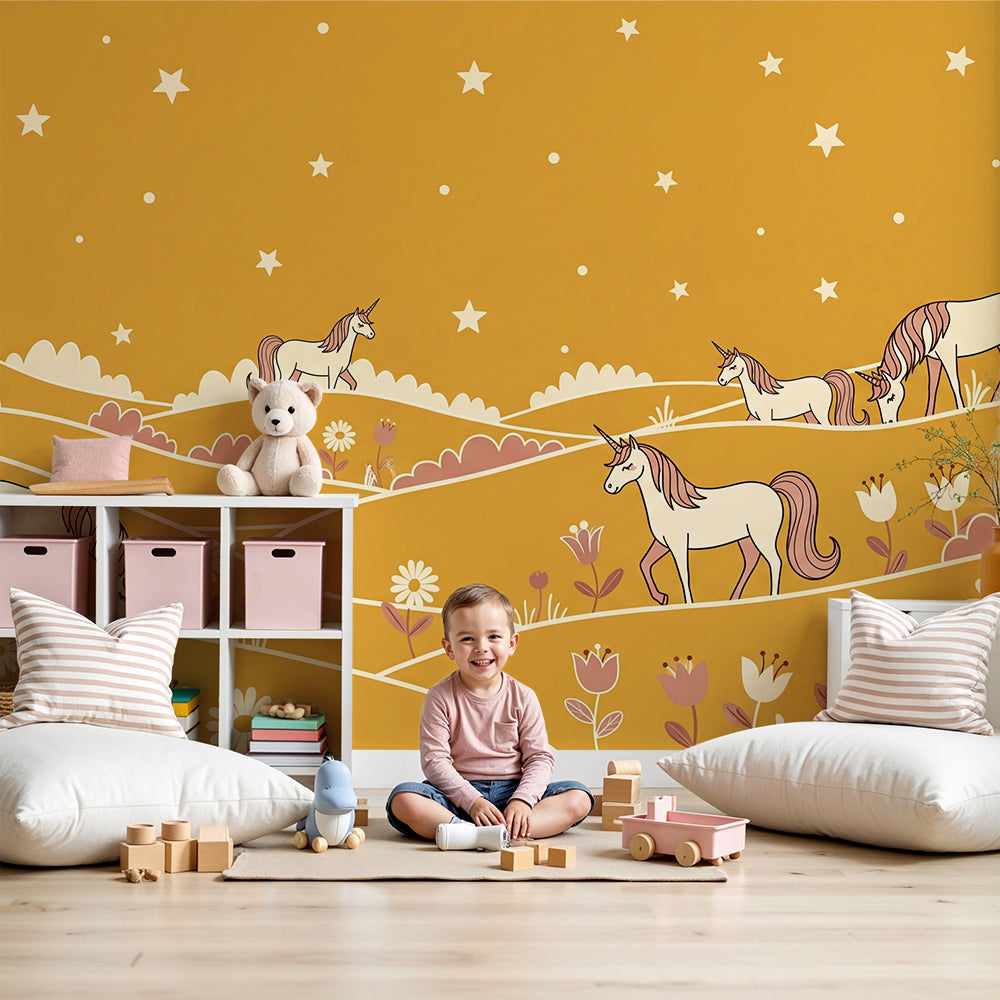 Kids-Mundo starry hills unicorn wall mural styled behind a cot in a warm golden nursery