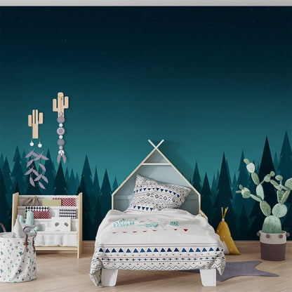 Kids-Mundo starry night forest wall mural covering a wall in a playful children's playroom