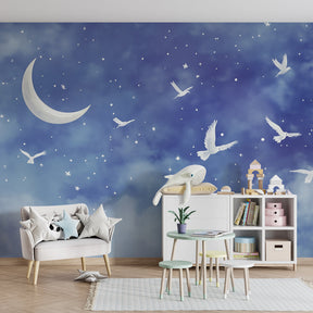 Celestial night sky wallpaper featuring moon and doves in peaceful kids bedroom setting