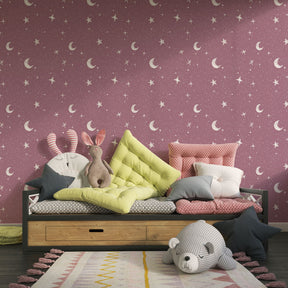 Celestial moon and stars wallpaper creating dreamy atmosphere in children's bedroom