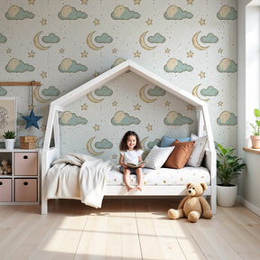 Starry sky mural wallpaper with clouds and moons in modern nursery by Kids-Mundo
