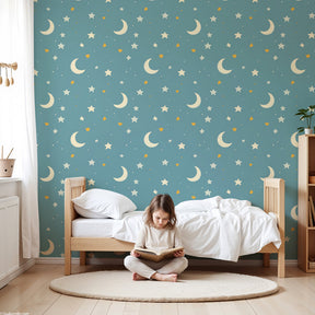 Starry sky mural wallpaper with golden moons and stars in modern nursery by Kids-Mundo