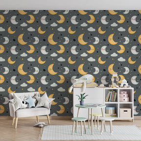 Celestial children's wallpaper featuring smiling moons and clouds in toddler bedroom