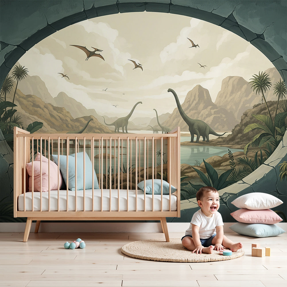 Kids-Mundo dinosaur valley wall mural in a soft green nursery with a cot and warm natural light.