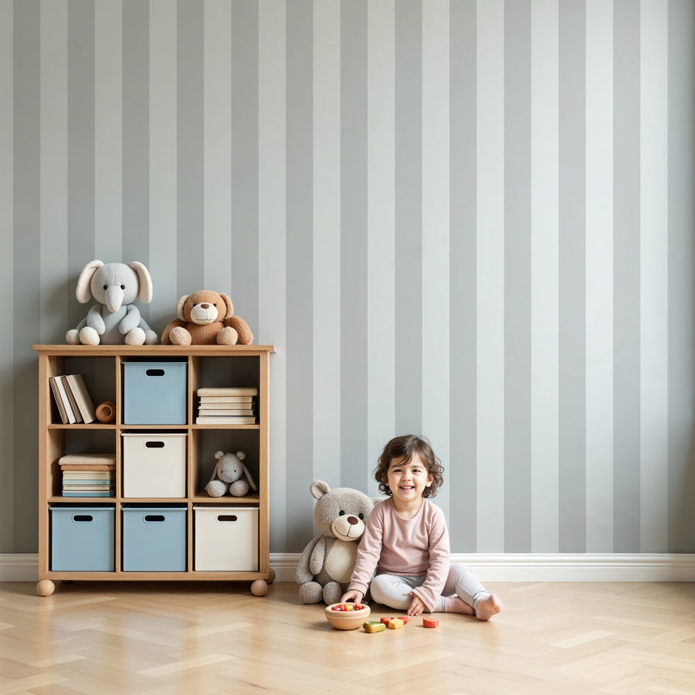 Soft gray striped mural wallpaper in modern nursery with white furniture by Kids-Mundo