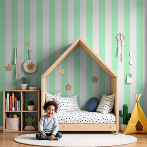 Elegant pastel green striped mural wallpaper in modern nursery setting by Kids-Mundo