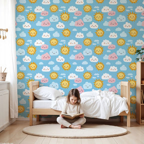 Sunny sky mural wallpaper with smiling clouds in bright kids nursery by Kids-Mundo
