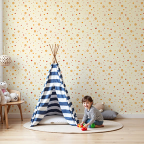 Sunshine mural wallpaper with colorful bursts decorating bright children's bedroom by Kids-Mundo