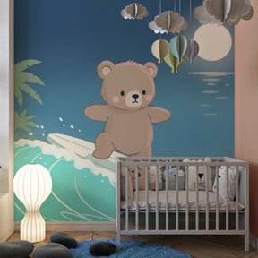 Ocean adventure wallpaper featuring surfing bear creating tropical kids bedroom atmosphere
