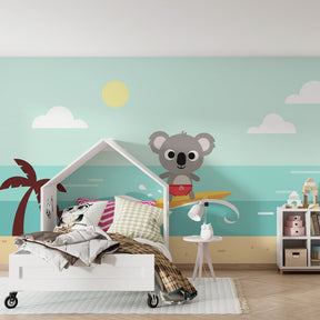 Beach themed koala wallpaper transforming children's bedroom with tropical palm trees and ocean waves