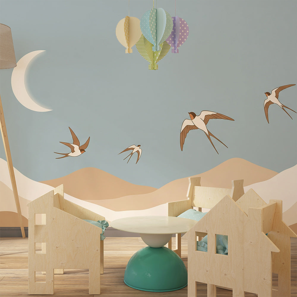 Kids-Mundo swallows flying over mountains wall mural in a bright playroom