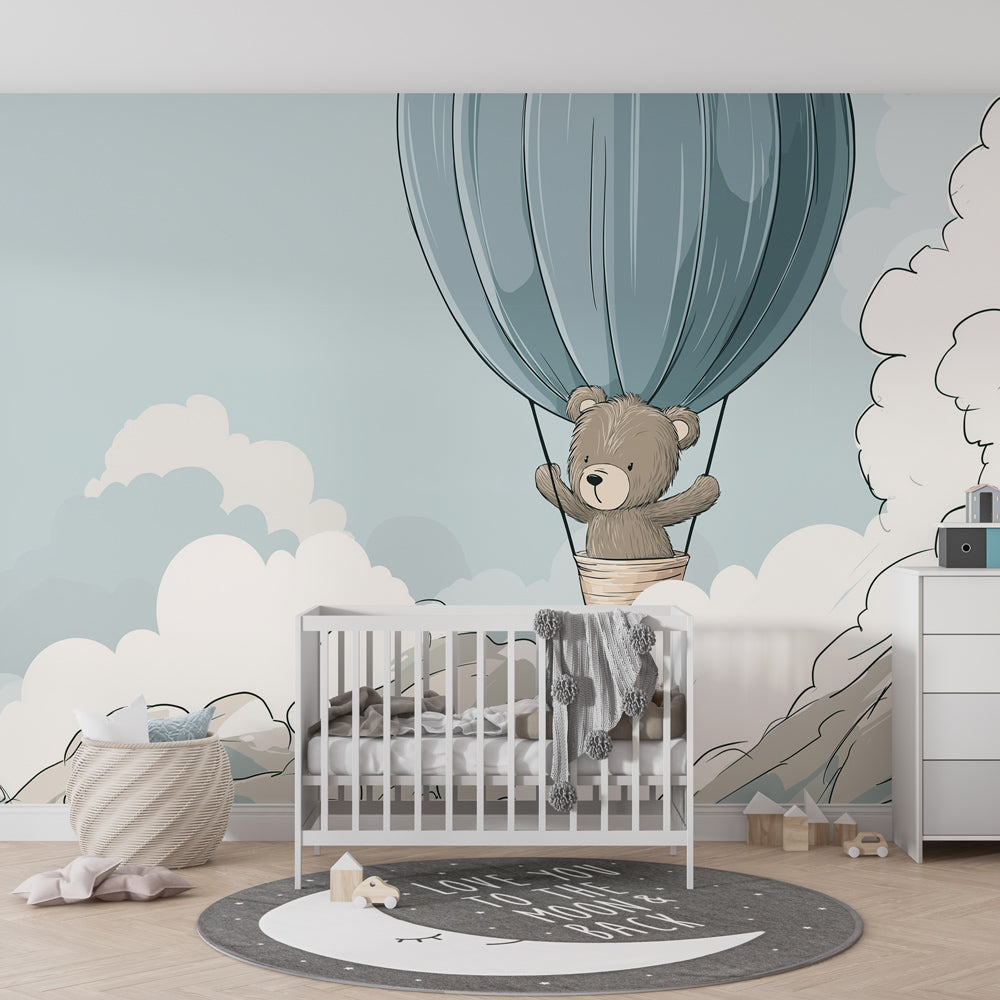 Kids-Mundo hot air balloon wall mural covering a baby bedroom feature wall with a cuddly bear