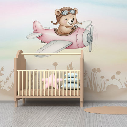 Kids-Mundo teddy bear plane wallpaper mural in a dreamy pastel kids bedroom wall.