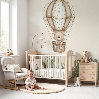 Kids-Mundo teddy bear balloon wall mural above a cot in a calm, neutral nursery