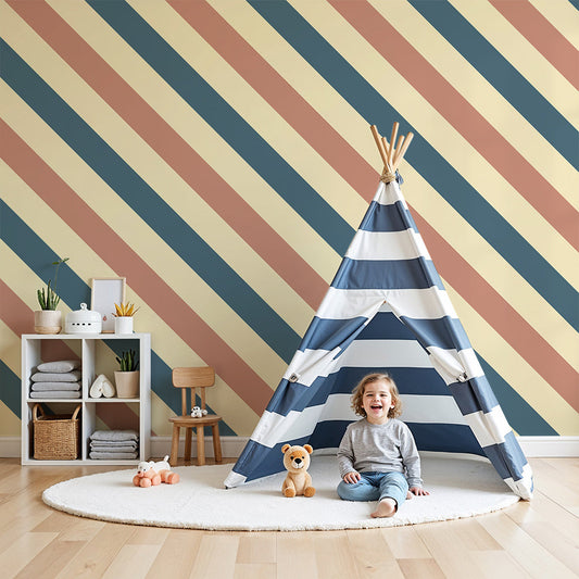 Kids-Mundo terracotta and navy diagonal stripe wall mural styled in a bright nursery with a cot.