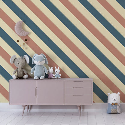 Kids-Mundo diagonal stripe wall mural in terracotta and navy adding colour to a children's playroom.