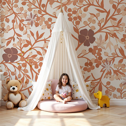 Kids-Mundo terracotta wildflower and berry wall mural styled behind a cot in a warm neutral nursery
