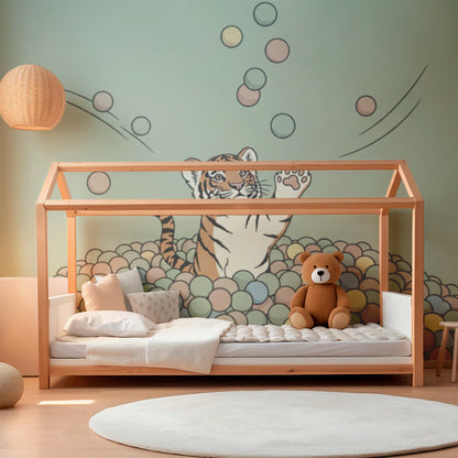 Kids-Mundo bouncy tiger ball pit wall mural brightening a busy playroom