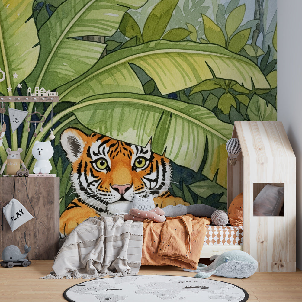 Kids-Mundo tiger cub peeking through leaves mural in a bright children's playroom