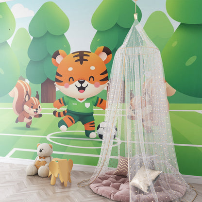 Kids-Mundo tiger footballer wall mural styled behind a football net and toy crate in a playroom.