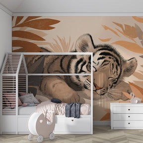 Adorable sleeping tiger cub mural wallpaper for children's safari themed room
