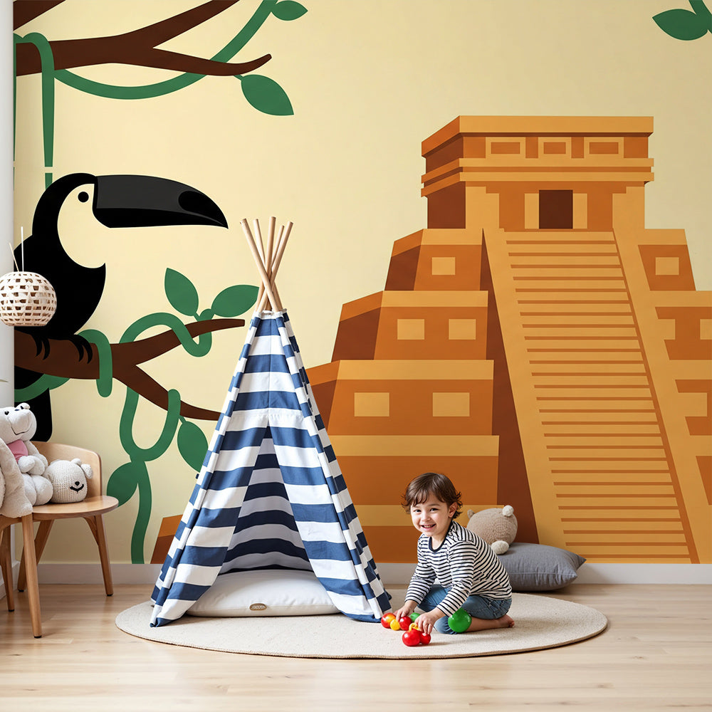 Kids-Mundo toucan and Mayan temple wall mural styled in a nursery with cot and warm decor.