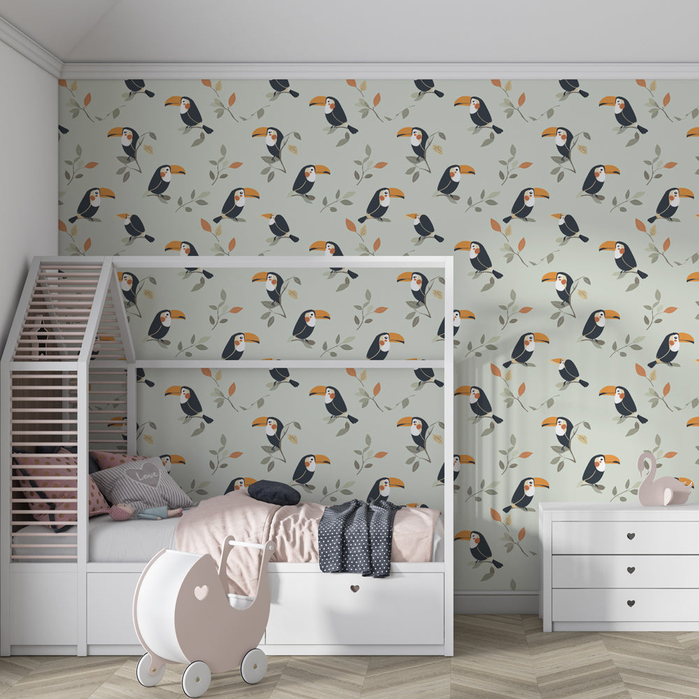 Colorful toucan bird wallpaper creating jungle themed children's bedroom with pastel background