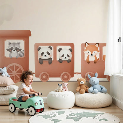 Kids-Mundo toy train wall mural with panda and fox friends above a baby nursery cot
