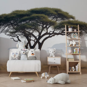 Nature-inspired tree mural wallpaper transforming kids playroom into peaceful forest sanctuary