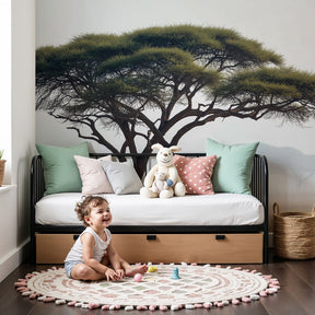 Majestic tree mural wallpaper in misty forest theme decorating modern kids nursery by Kids-Mundo