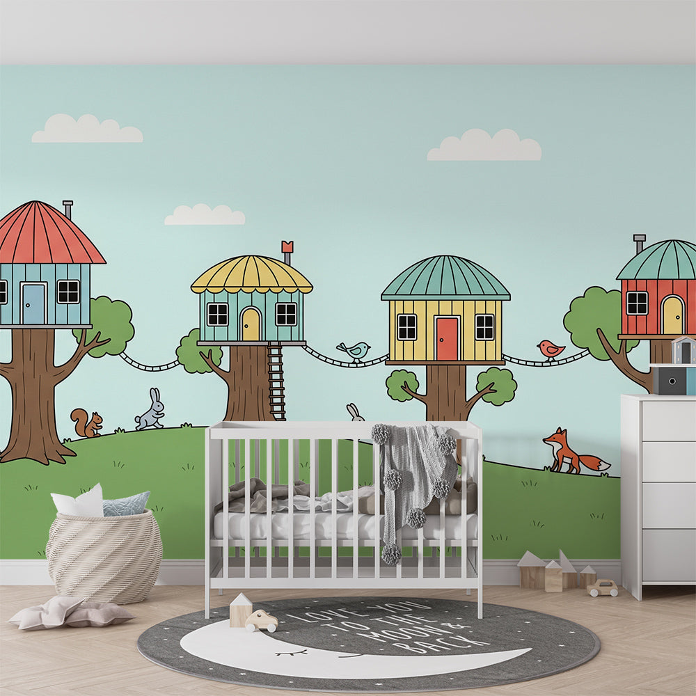 Kids-Mundo treehouse village wall mural bringing rabbits and a fox to a bright playroom.