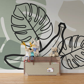 Exotic banana and leaves mural wallpaper transforming kids playroom into tropical oasis