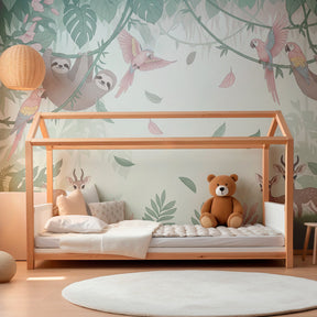 Jungle mural wallpaper featuring colorful parrots and gentle fawns in playroom setting