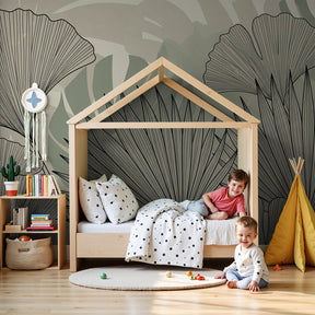 Tropical leaves mural wallpaper creating calm atmosphere in modern kids nursery by Kids-Mundo