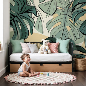 Tropical monstera leaves mural wallpaper in modern nursery with natural wood crib by Kids-Mundo