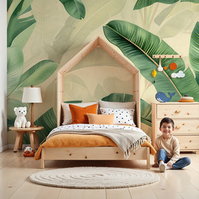 Tropical leaves mural wallpaper creating serene nursery decor with lush green foliage by Kids-Mundo