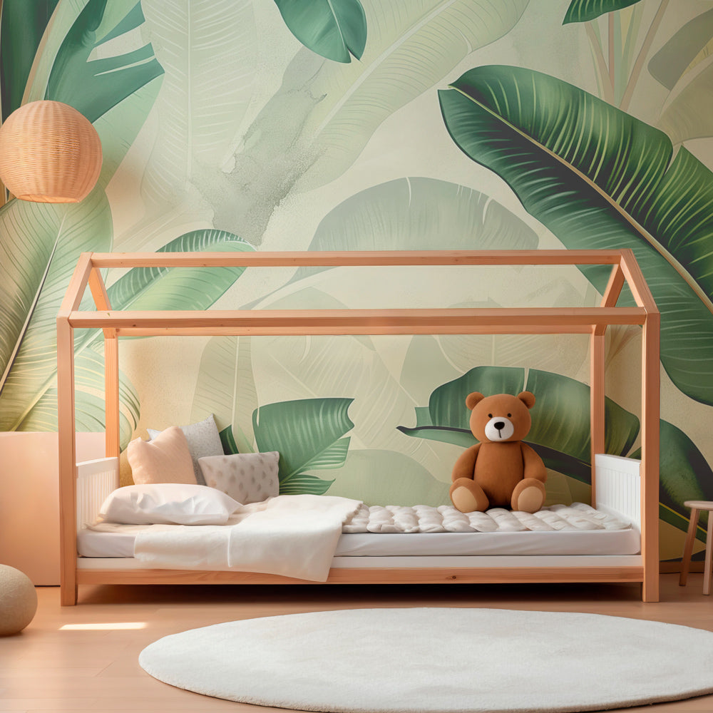 Lush tropical foliage mural wallpaper creating jungle-themed playroom for kids by Kids-Mundo