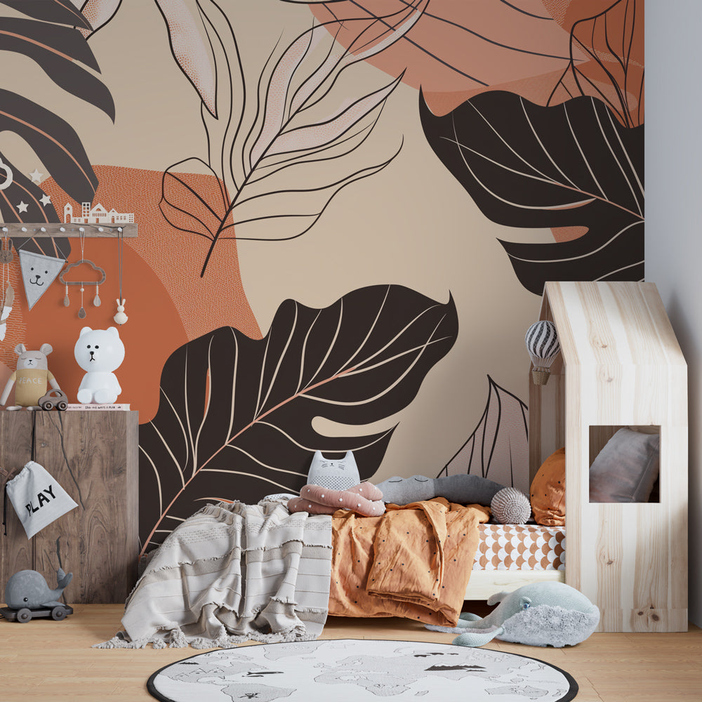 Black and terracotta tropical leaf wallpaper transforming kids playroom into nature-inspired space