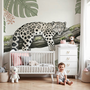 Tropical leopard mural wallpaper in modern nursery with natural wood crib by Kids-Mundo