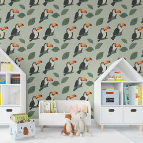 Colorful toucan wallpaper creating tropical jungle theme in children's bedroom decor